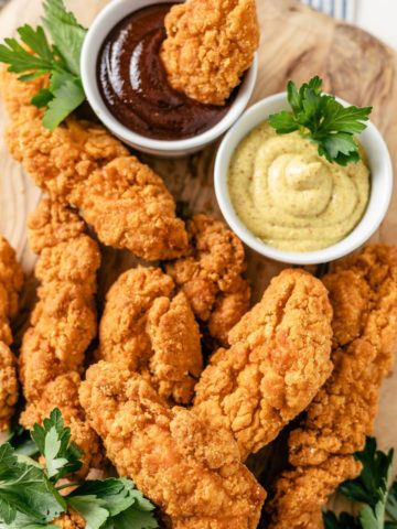 Crispy Air Fryer Frozen Chicken Tenders with dips on the side