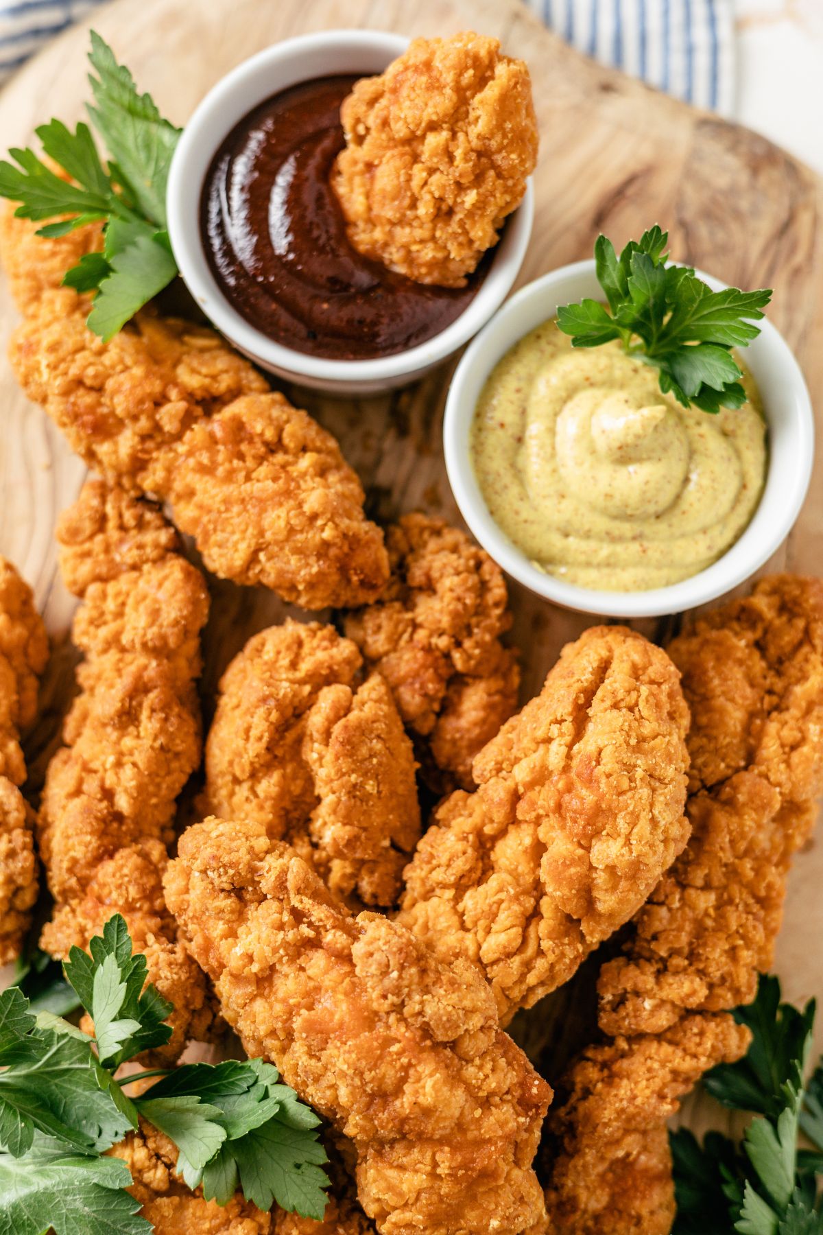 Crispy Air Fryer Frozen Chicken Tenders with dips on the side