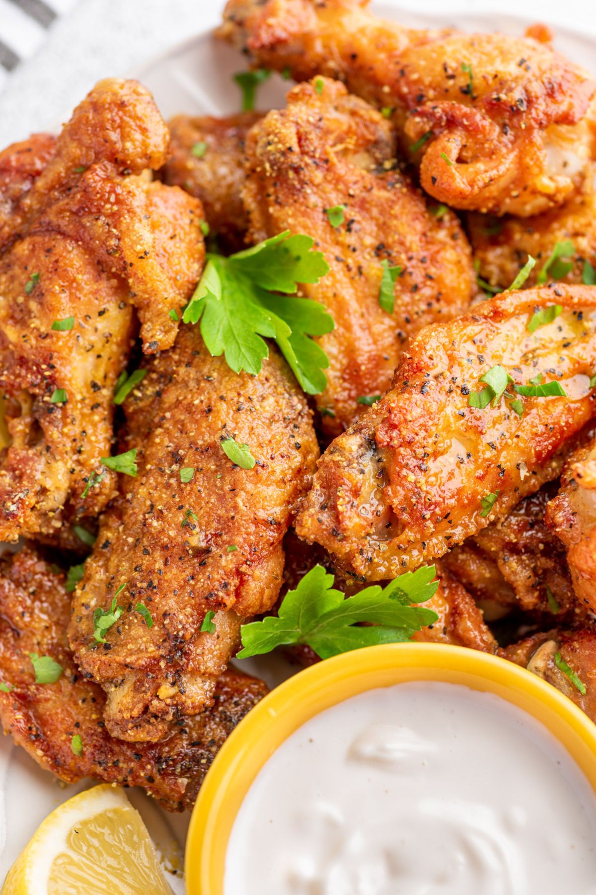 Baked Lemon Pepper Chicken Wings with ranch dip on the side