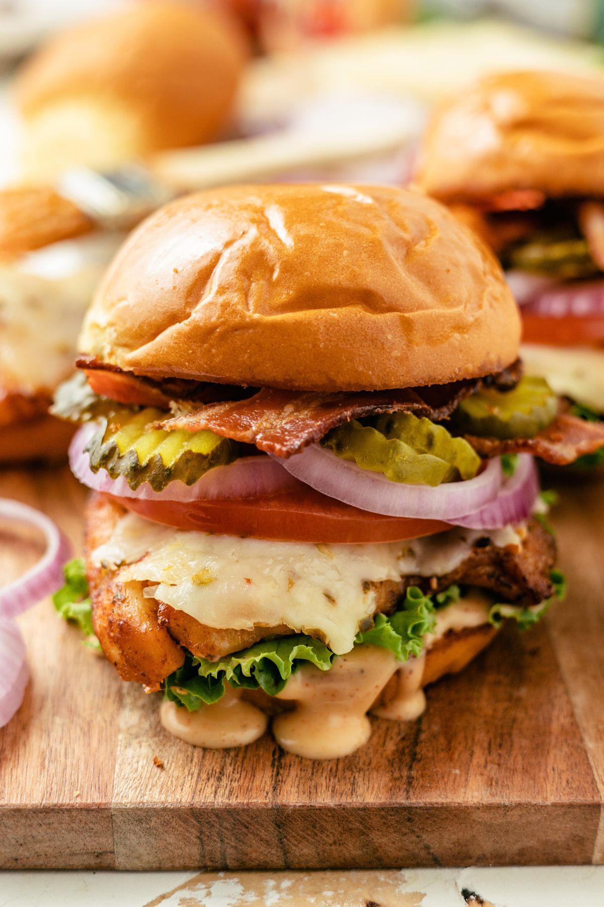 overhead photo of a Cajun Chicken sandwich with spicy cajun mayo and burger toppings
