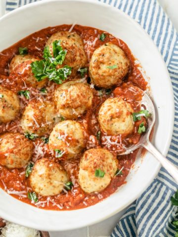Juicy air fryer chicken meatballs in a large bowl.