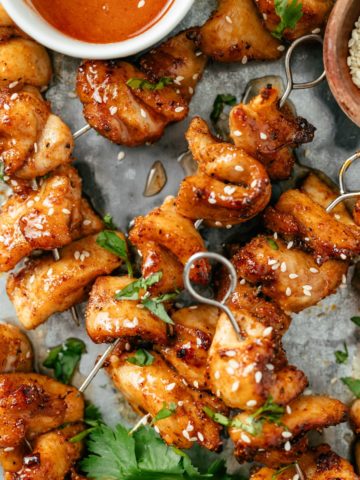 Juicy chicken skewers cooked to perfection in an air fryer with a golden-brown exterior.